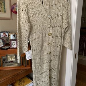 Hand knitted 100 % silk Jacket or dress Sold